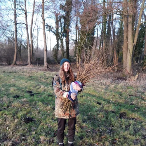 Katja standing in a meadow 