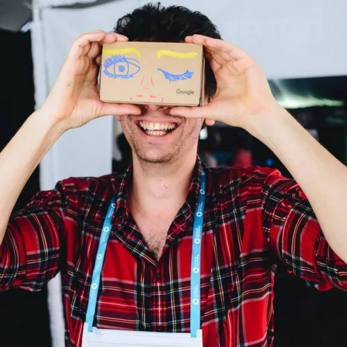 Roman Miletitch with a cardboard headset on